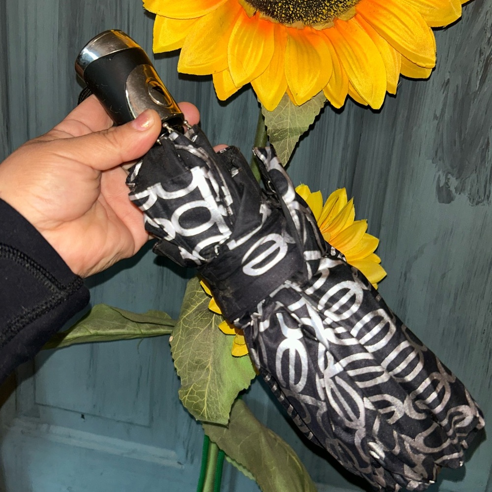 Bebe Black and Silver Logo Accessory